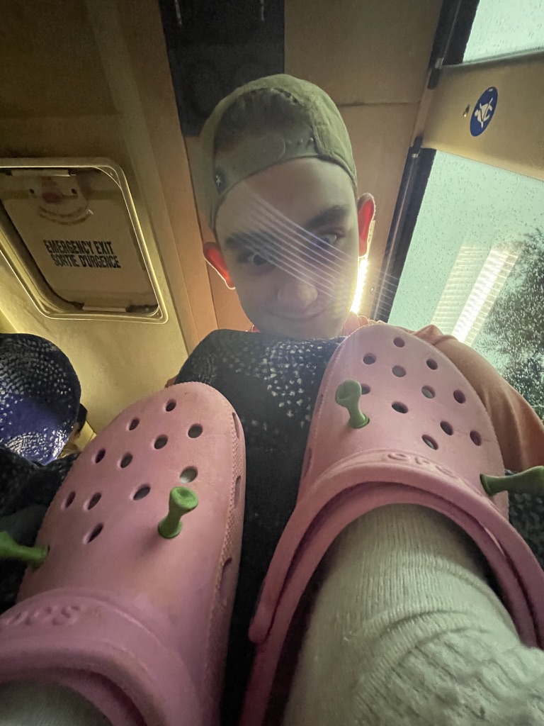 Croc Shrek ears on the bus