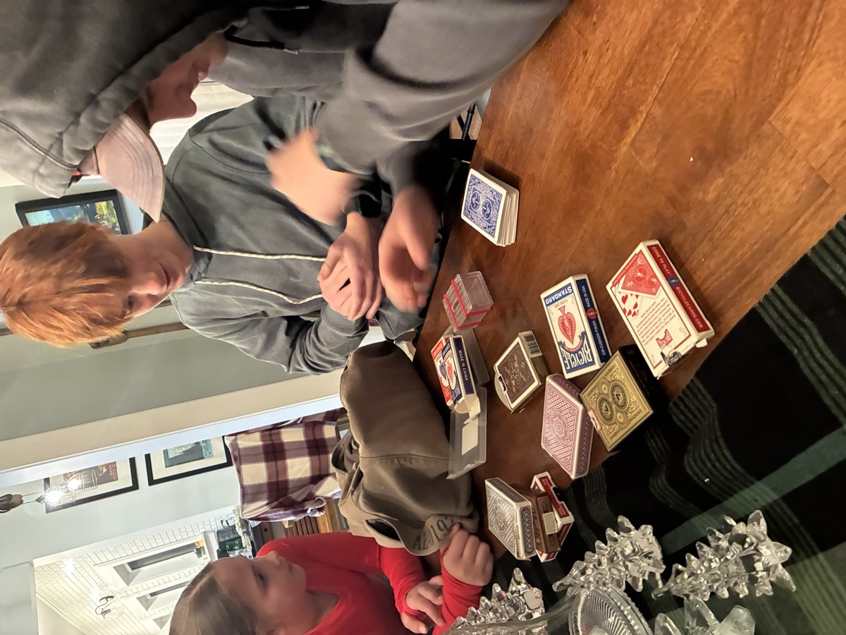 Nash and cousins learning card tricks together